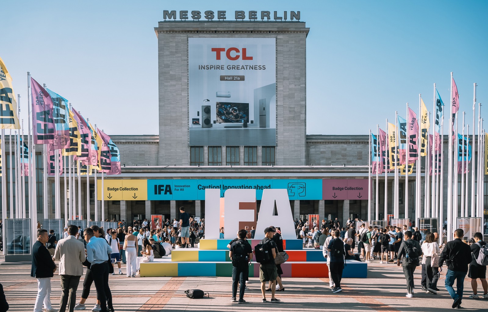 Messe Nord Berlin with historic building, large white 'IFA' letters, and many visitors in front of the entrance